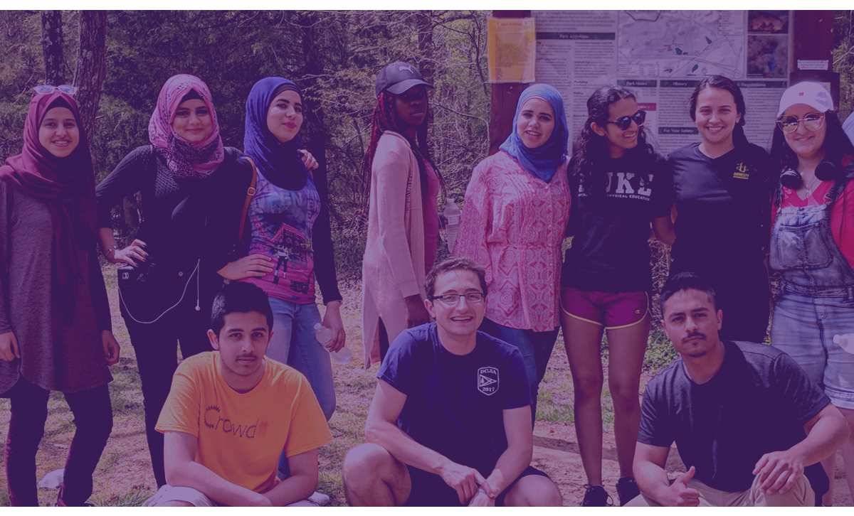 Volunteers in the Kenan Refugee Project pose for a photo