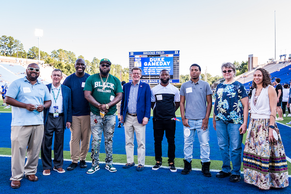 Community honorees on the field at Wallace Wade